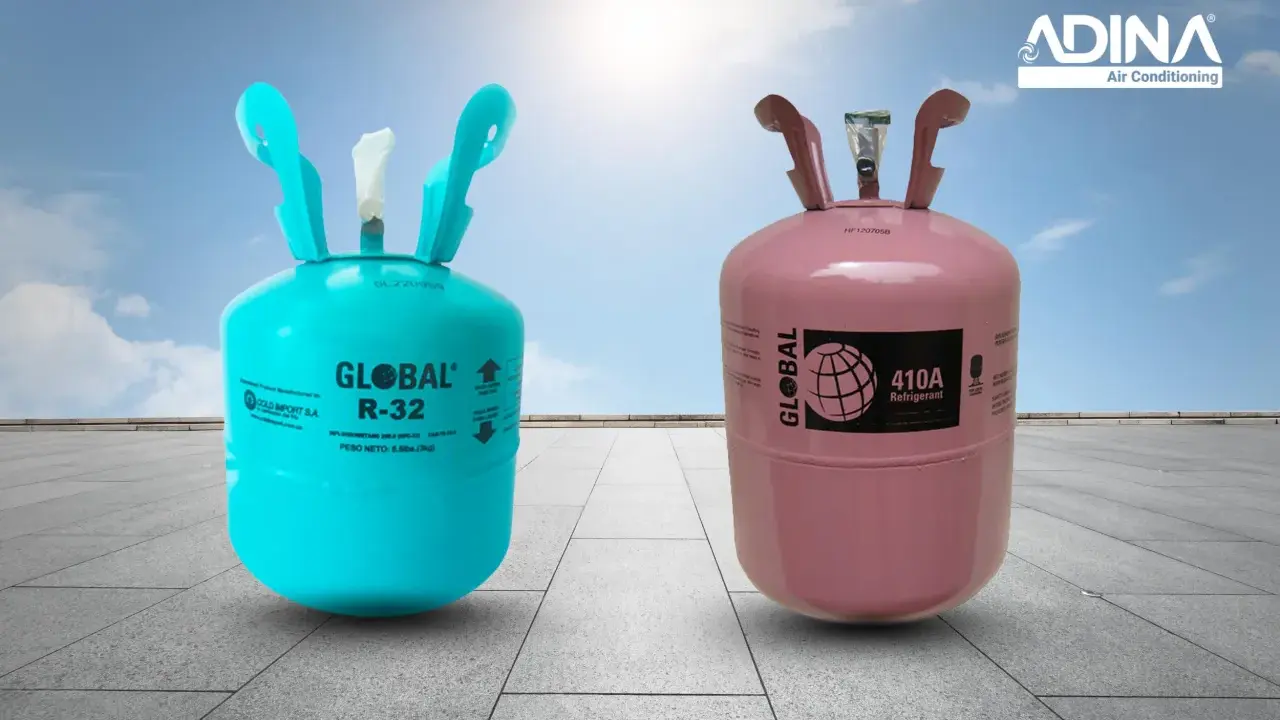 Dos cilindros de gas refrigerante: uno azul con etiqueta "GLOBAL R-32" y otro rosa con "GLOBAL 410A". Ideales para tu sistema de gas aire acondicionado.