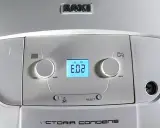 Caldera Baxi Victoria Condens con display que muestra "E.02", indicando un problema.