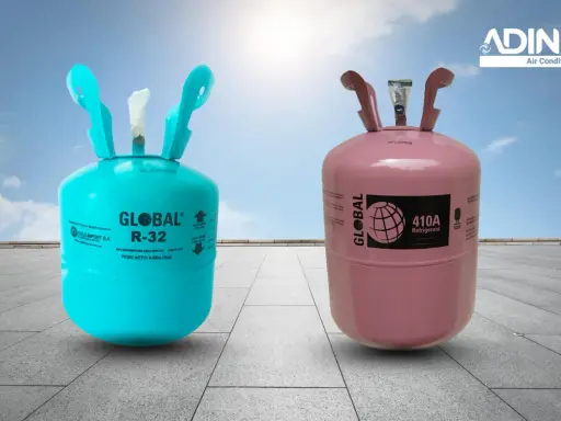 Dos cilindros de gas refrigerante: uno azul con etiqueta "GLOBAL R-32" y otro rosa con "GLOBAL 410A". Ideales para tu sistema de gas aire acondicionado.