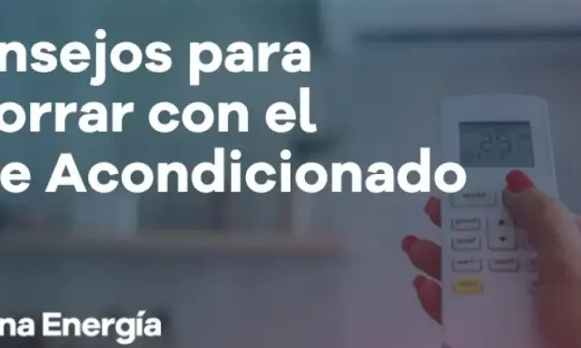 Consejos para reducir el consumo de aire acondicionado. Una mano sostiene un control remoto, mostrando la temperatura.