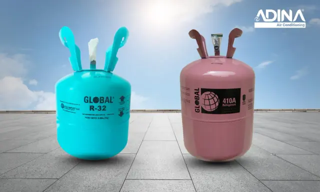 Dos cilindros de gas refrigerante: uno azul con etiqueta "GLOBAL R-32" y otro rosa con "GLOBAL 410A". Ideales para tu sistema de gas aire acondicionado.